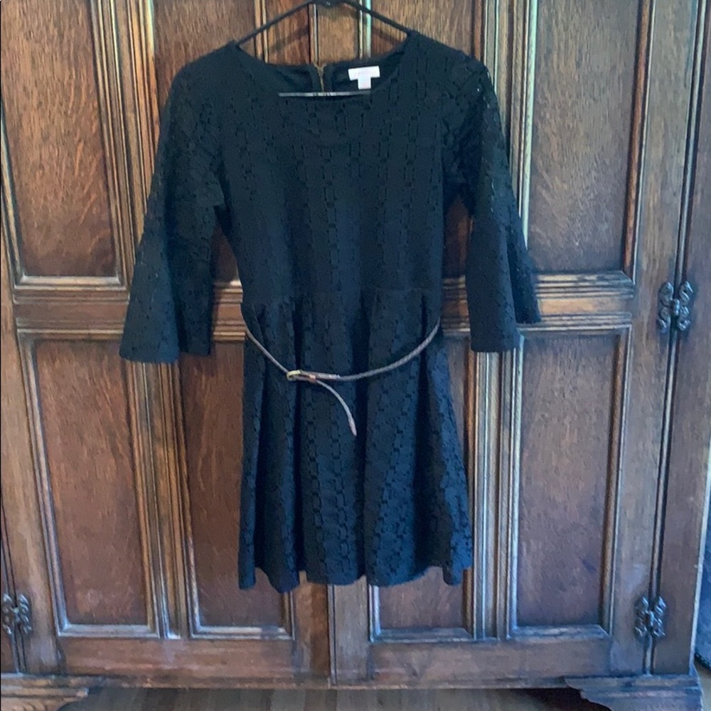 Black girls dress crocheted/ lace material .